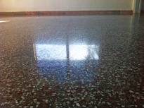 This terrazzo floor was in bad shape. It took a lot of work, but the final result was great.